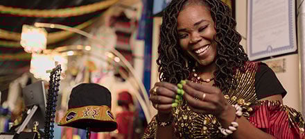 Woman trying on jewelry